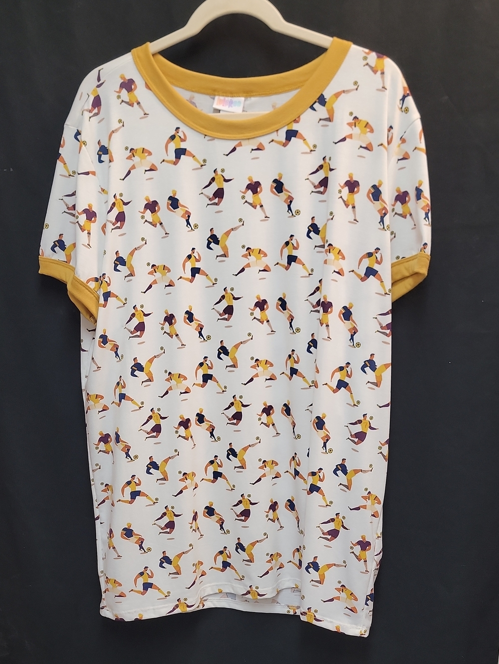 LuLaRoe White Short-Sleeve Tee with Mustard Trim and Multicolor Sports Print